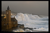 Storm wave hitting sea defences